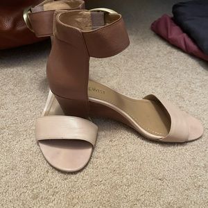 Nine West two toned wedges with ankle strap and gold buckle.